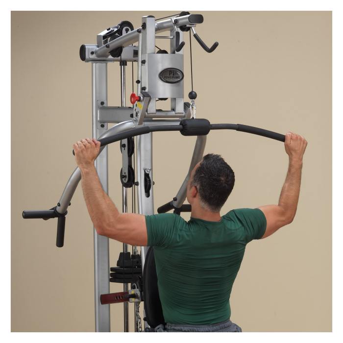 The main pressing arm can conveniently slide out of the way, leaving you more space to perform lat pulldowns