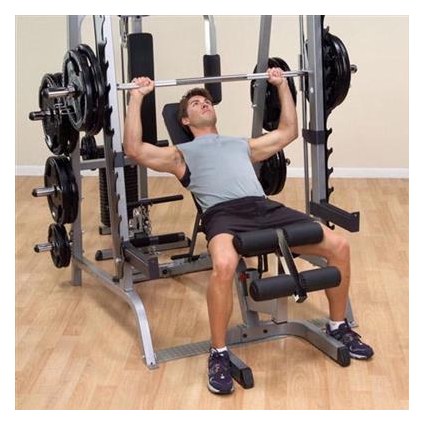 The smith machine bar follows a 7 degree reverse pitch, which is a more natural range of motion for your body to move through