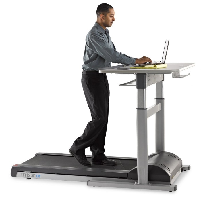 The DT7 treadmill desk features an electronic desk height adjustment system