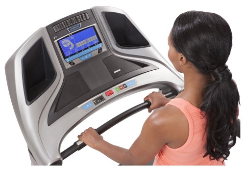 The Elite T7 treadmill features an extra-wide blue LCD display