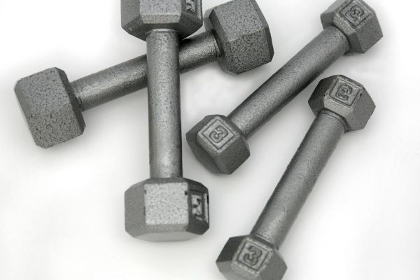 Grey dumbbells on the floor