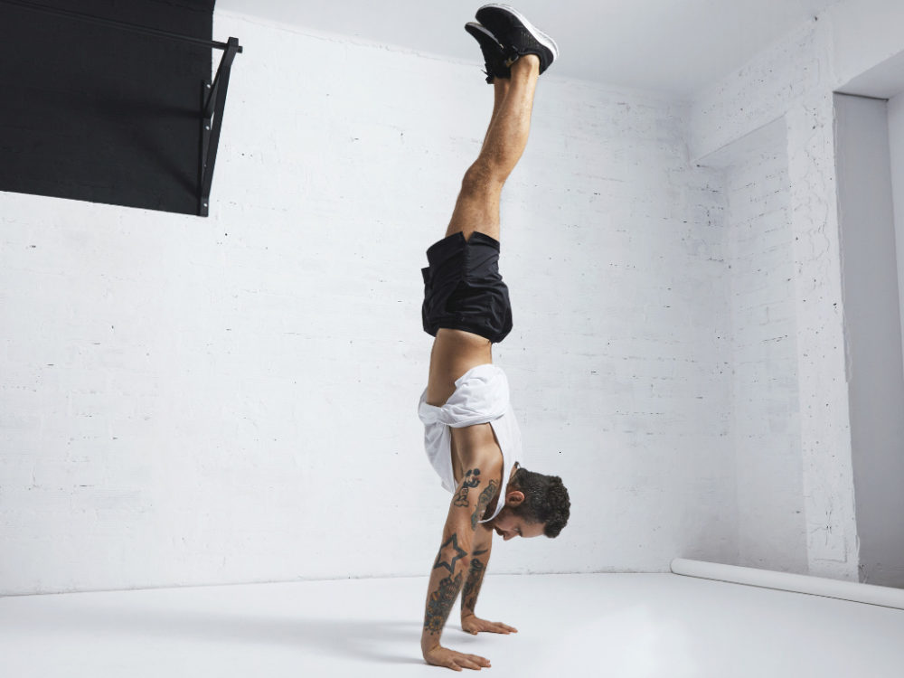 man doing handstand