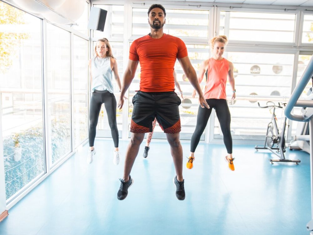 man performing basic calisthenics training by doing burpees
