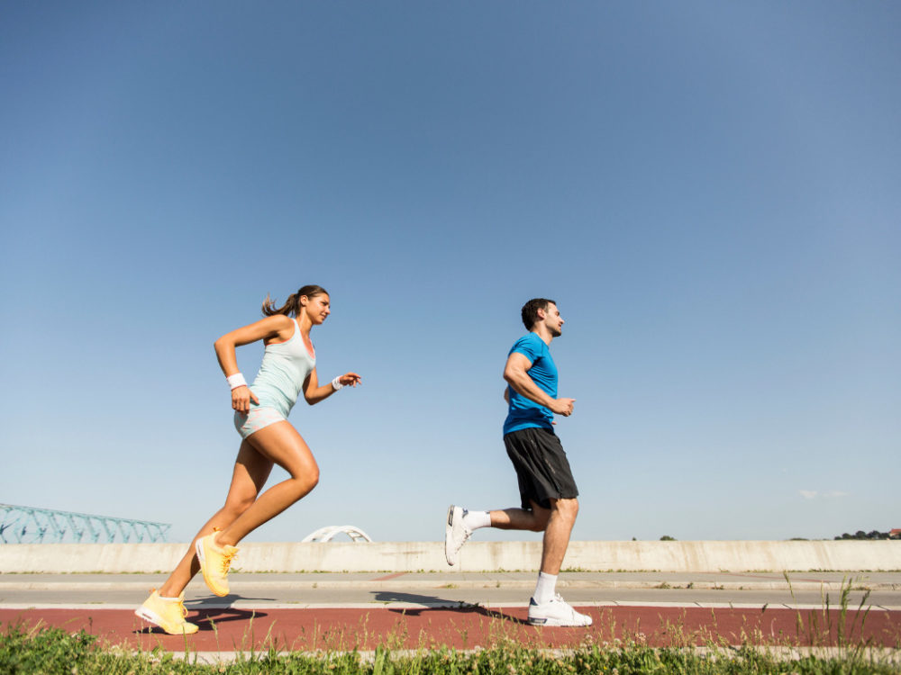 man and woman doing sprints