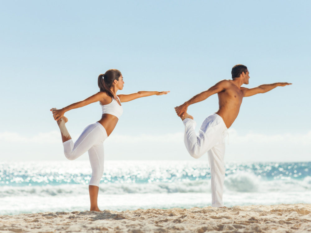 man and woman stretching
