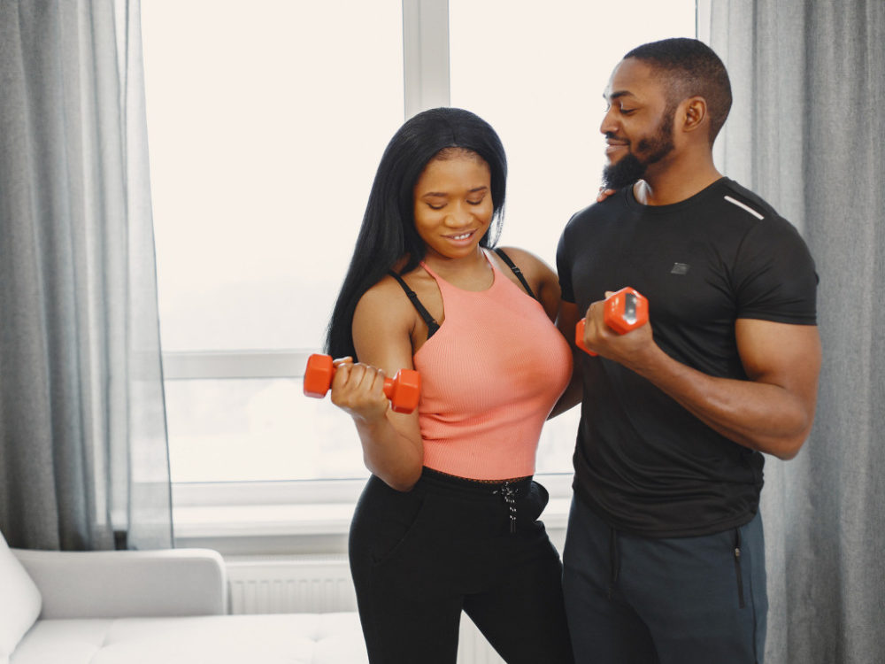 man and woman working out