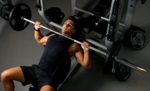 man-doing-close-grip-bench-press