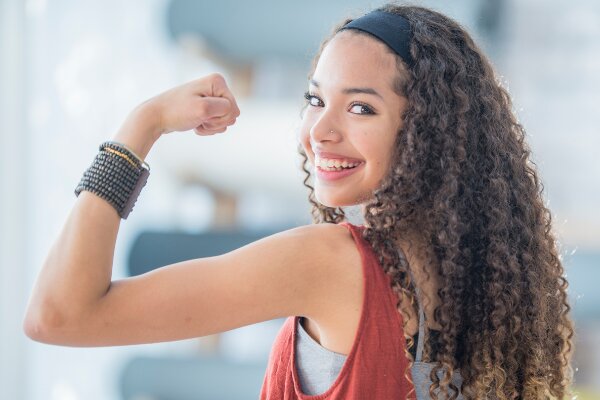 woman showing muscles