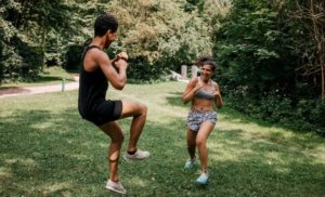 two people performing a workout together