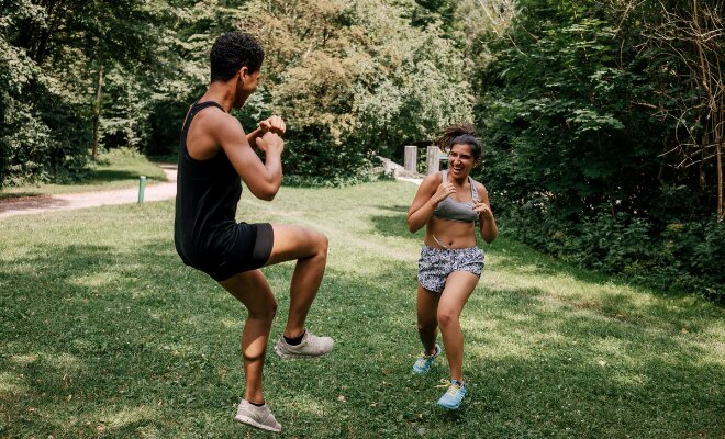 two people performing a workout together