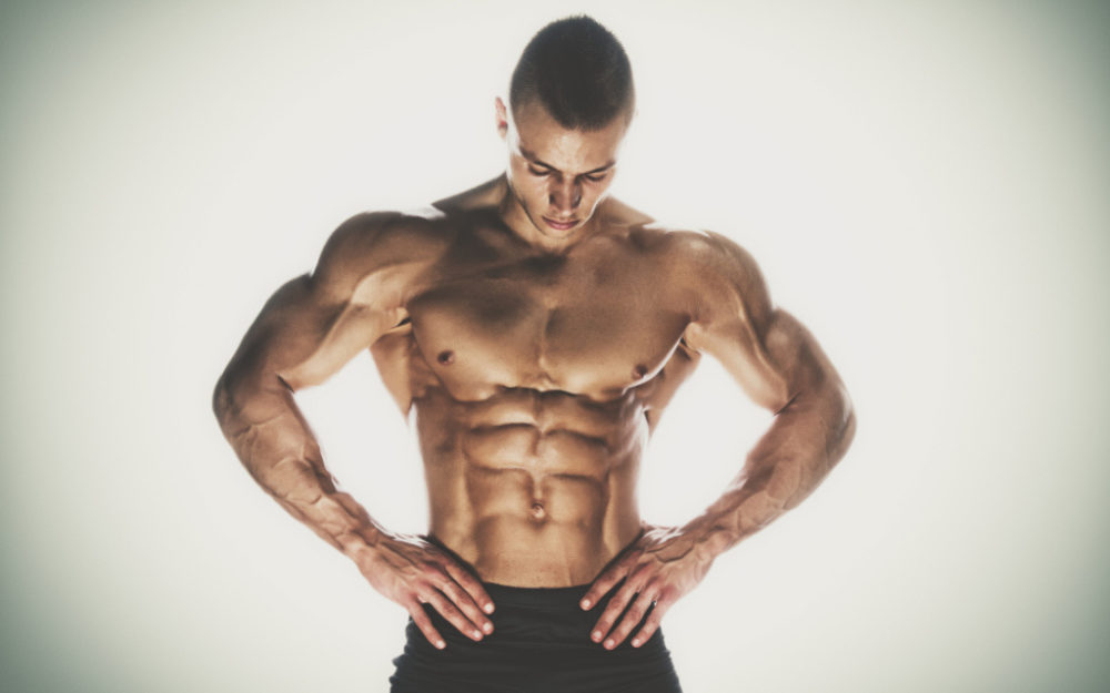 man showing off his V-shape
