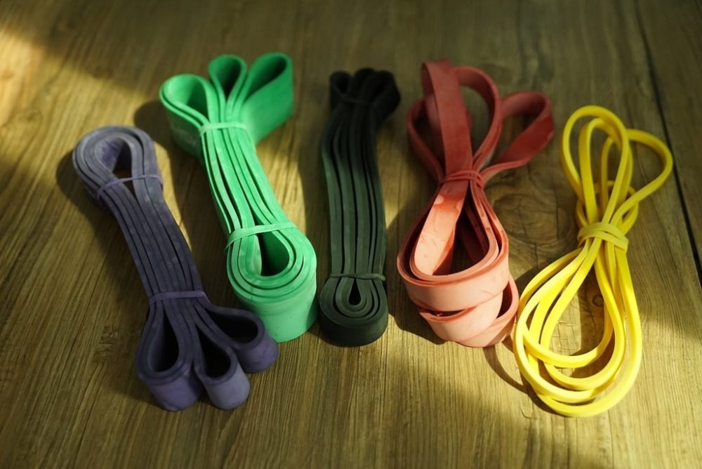 Best resistance bands lined up on wooden floor