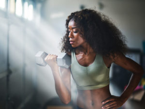 woman using using weights