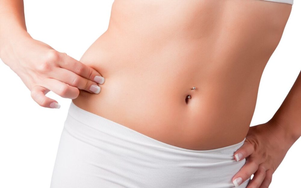 woman pinching skinny fat