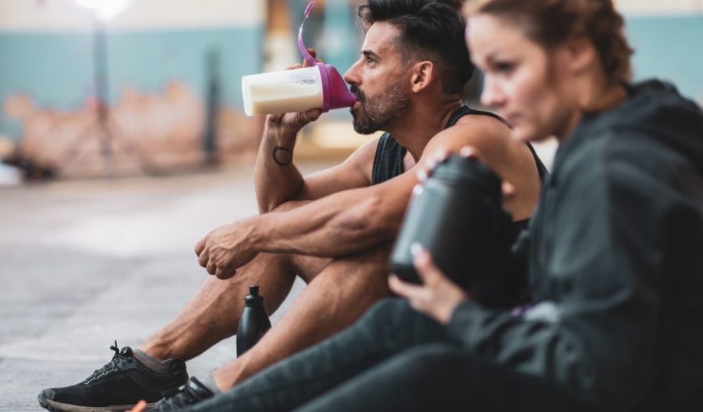 couple with sports protein shake