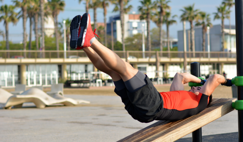 man doing leg ups