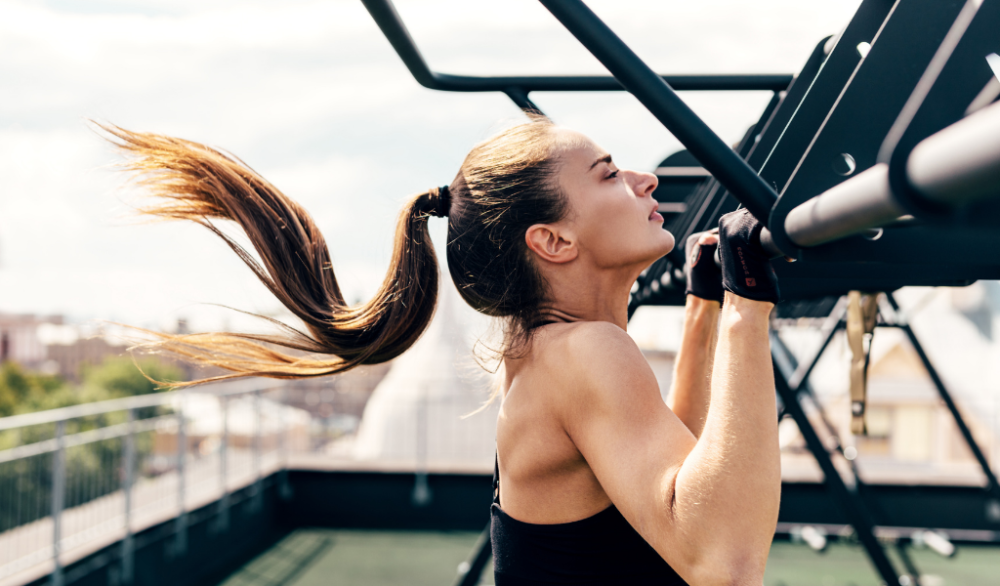 woman doing pull up
