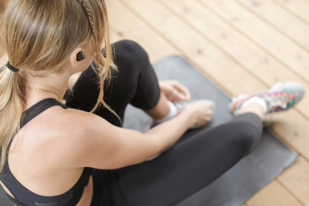 Person stretching after using Bowflex C6