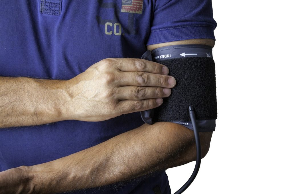 Man checking his own blood pressure