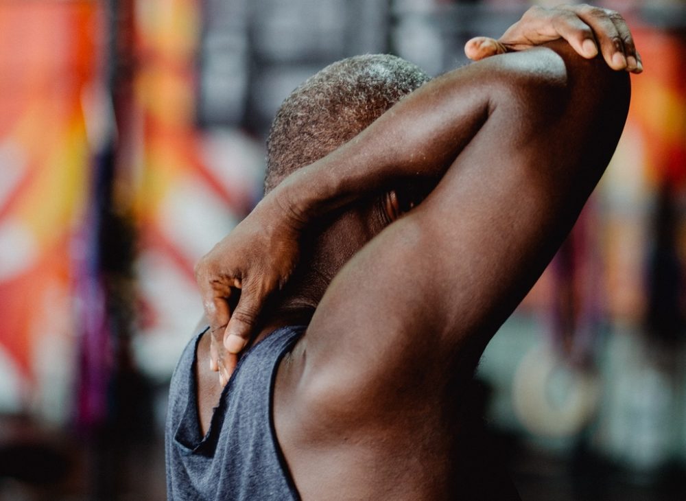 Man stretching triceps
