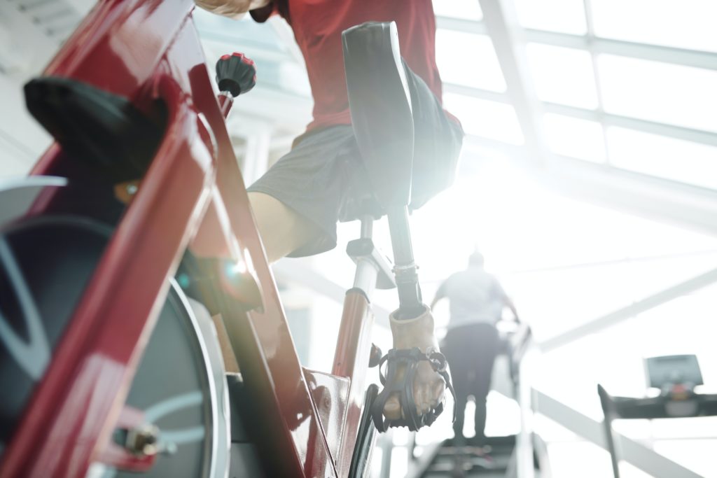 Man doing workout on stationary bike