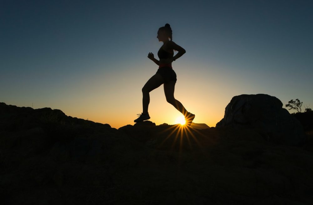 Person running against horizon
