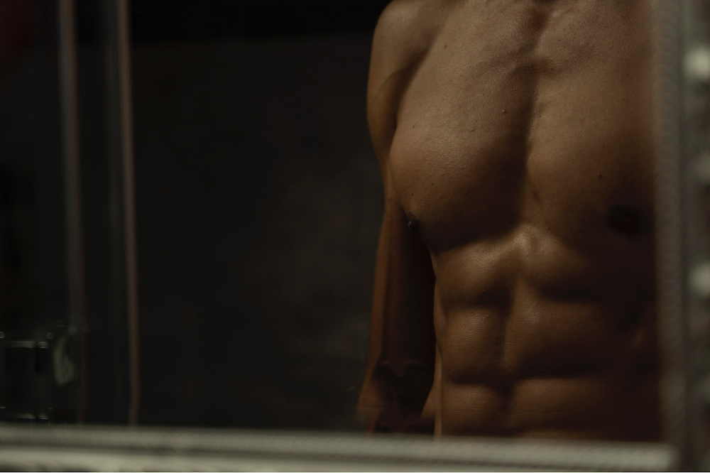 Man showing six pack