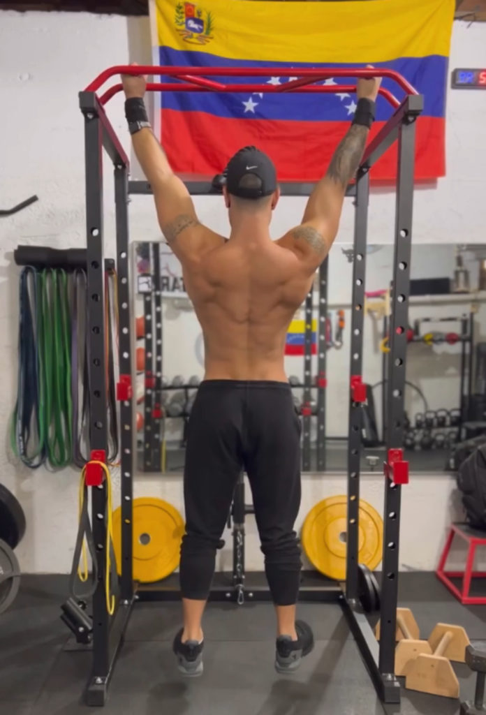 Man doing pullup on IFAST Power Rack