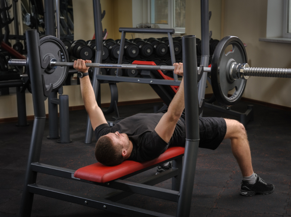 Man performing bench press exercise