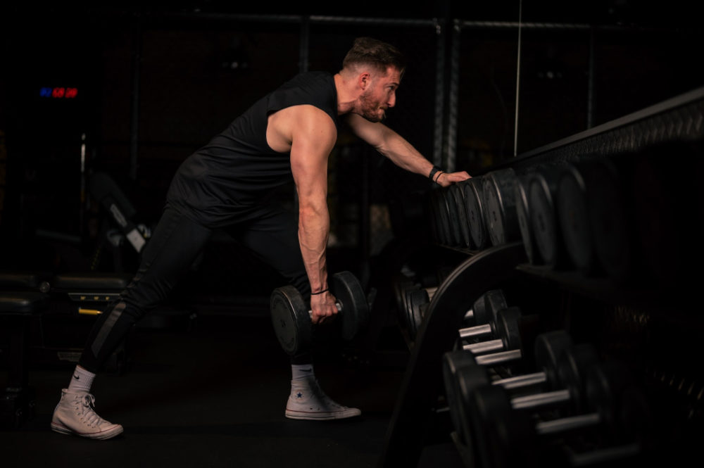 Standing dumbbell row as part of a pull day workout
