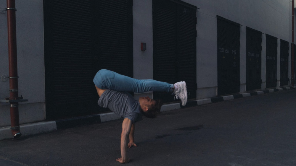 Man doing acrobatic exercises